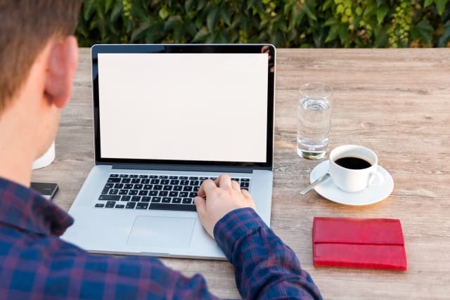 Man working using his laptop